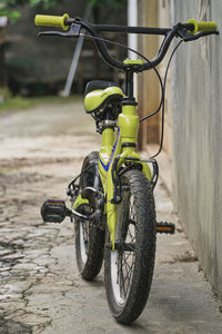 Close-up of bicycle parked on street