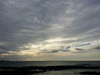 View of calm sea at sunset