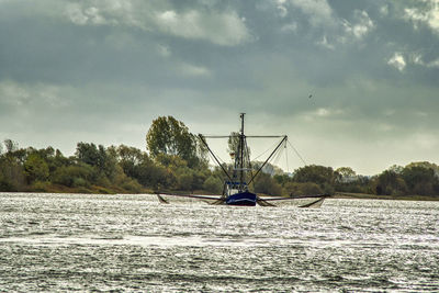 Scenic view of river against sky