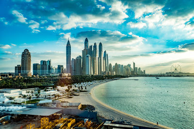 Panoramic view of city buildings against sky