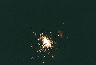 Illuminated fountain at night