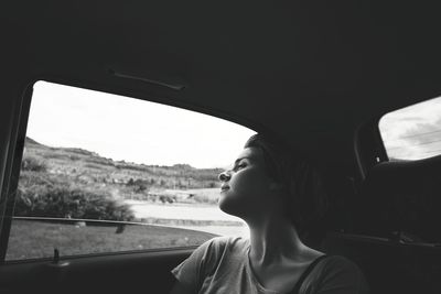 Woman traveling in car 