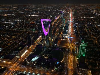 High angle view of illuminated cityscape at night