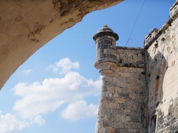 Low angle view of historic building against sky