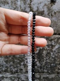 Close-up of hand holding ring