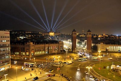 High angle view of illuminated cityscape at night