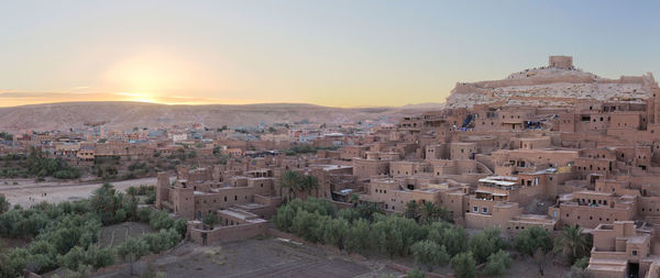 High angle view of townscape against sky during sunset