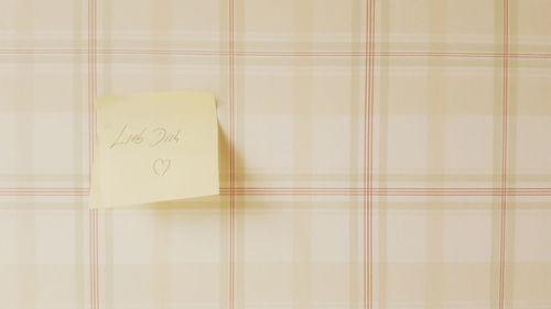 Close-up of text on shelf