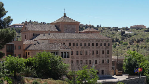 Exterior of historic building against clear sky