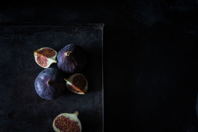 Close-up of fruits on black background