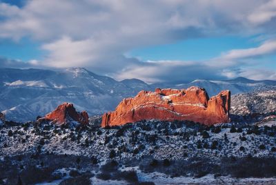 Scenic view of mountains against sky during winter