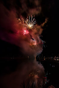 Firework display at night