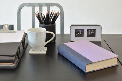 Close-up of coffee cup on table