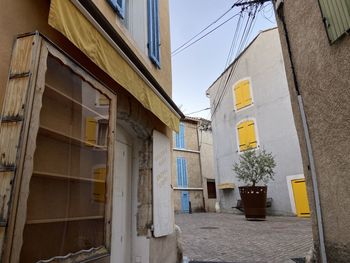 Street amidst buildings in city