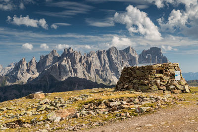 Stack of rocks on mountain against sky. col margherita. dolomites. italy