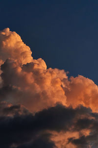Low angle view of clouds in sky during sunset