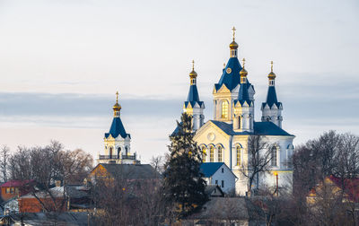 Panoramic view of the kamianets-podilskyi fortress on a winter night