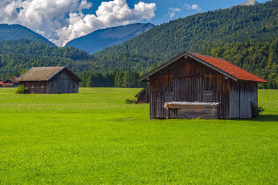 House on field against sky