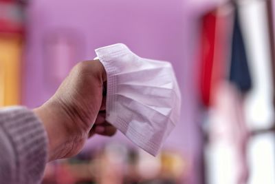 Close-up of man working on paper