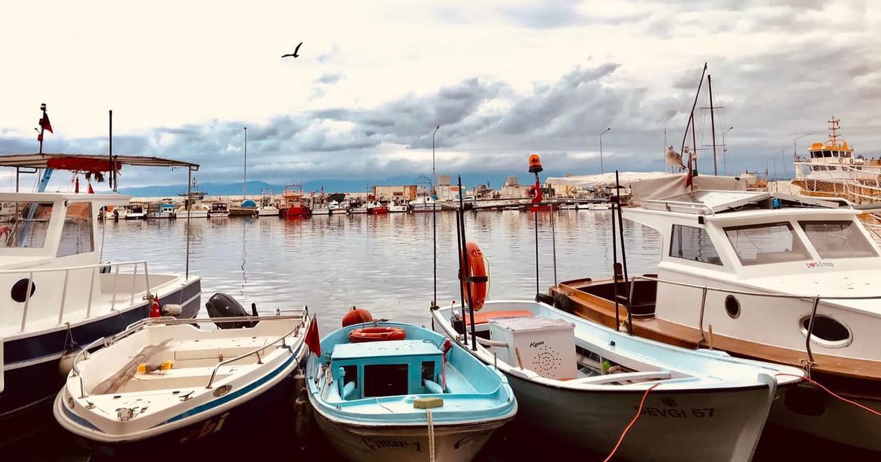 water, nautical vessel, transportation, mode of transportation, sea, sky, moored, cloud, harbor, nature, boat, pier, vehicle, travel, travel destinations, beach, no people, marina, sailboat, architecture, ship, land, dock, beauty in nature, outdoors, vacation, tourism, holiday, day, reflection, tranquility, trip, pole, wood, scenics - nature, watercraft, idyllic, tranquil scene, fishing industry, trawler, recreational boat, yacht, fishing