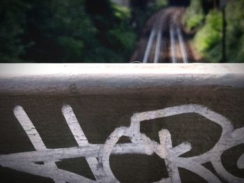 Close-up of arrow symbol on road