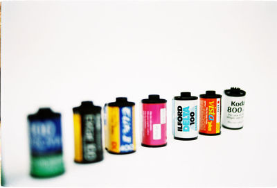 Close-up of multi colored pencils in row