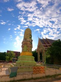 Sculpture of historic building against sky