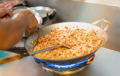 Close-up of person preparing food