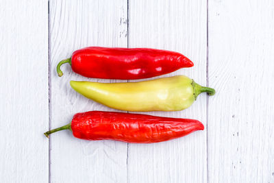 High angle view of red chili peppers on table