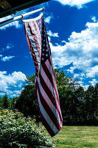 Red flag against blue sky