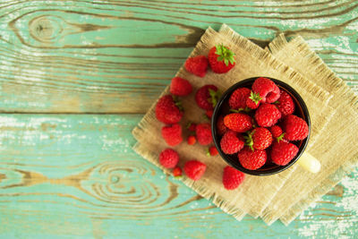 High angle view of strawberries on table