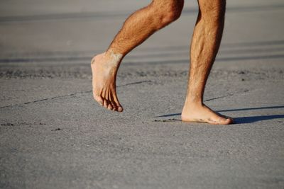 Low section of man on beach