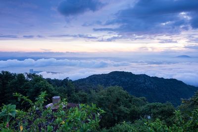 Scenic view of landscape against dramatic sky