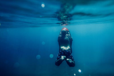 Man swimming in sea