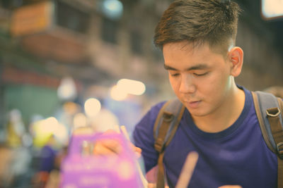 Close-up of man standing outdoors