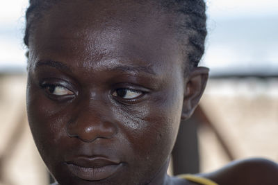 Close-up of woman looking away