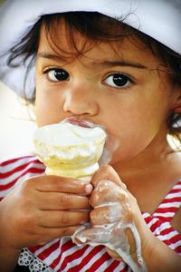 Portrait of girl holding ice cream