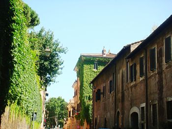 Low angle view of buildings against clear sky