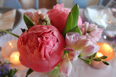 Close-up of pink roses on table