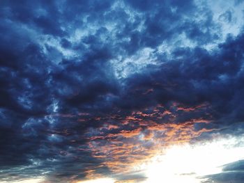 Low angle view of dramatic sky during sunset