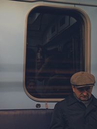 Portrait of man in train