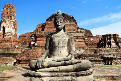 The ruins of ancient city with statue of buddha. ayutthaya historical park.