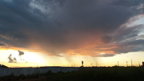 Scenic view of dramatic sky during sunset