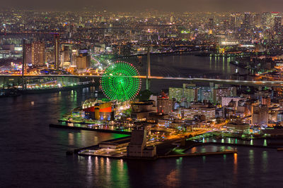 Illuminated buildings in city at night