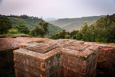 Retaining wall against mountains