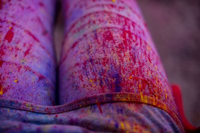 Midsection of woman with power paints