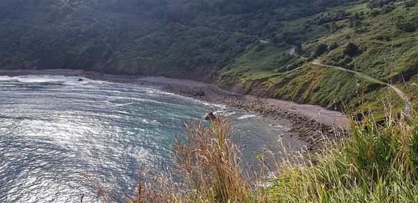 High angle view of sea and mountains