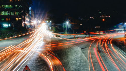 Light trails on city street at night