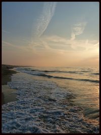 Scenic view of sea at sunset