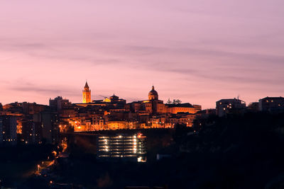 View of illuminated city at night